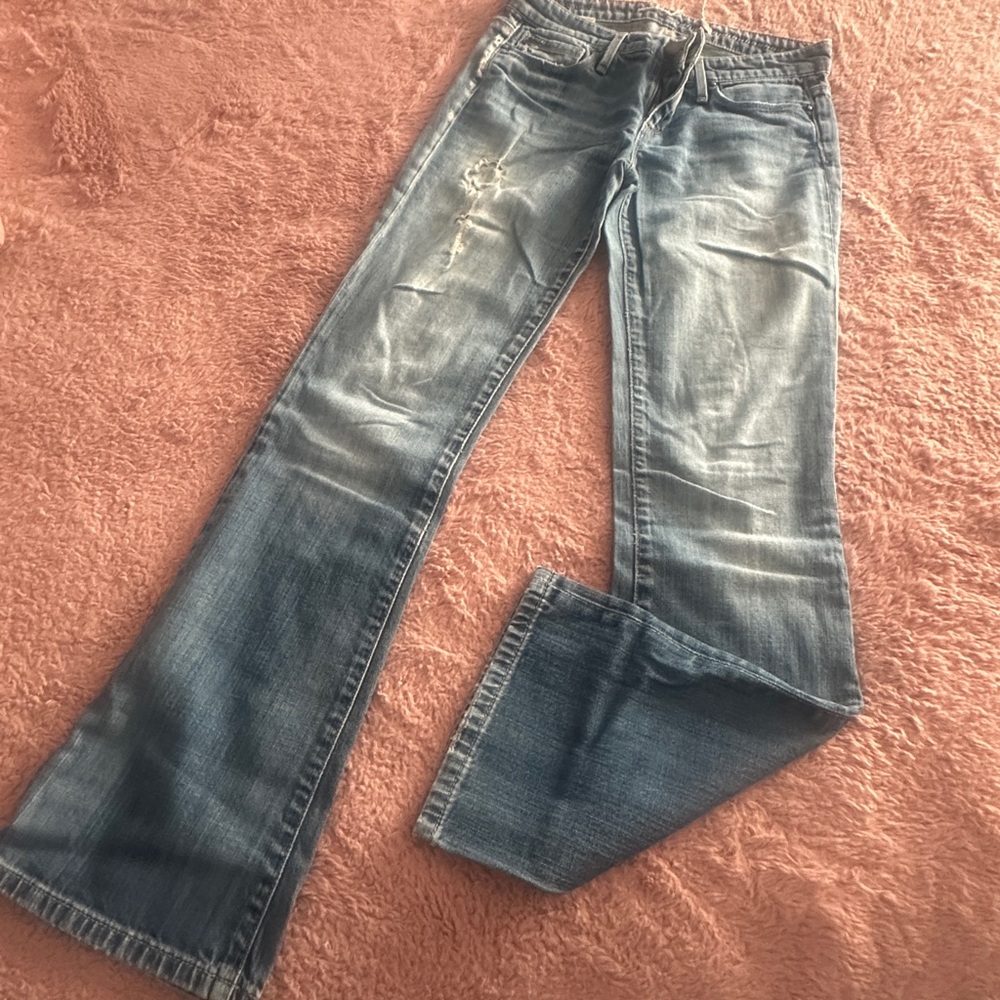 Distressed Blue Denim Jeans